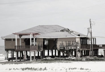Wind damage - spray foam can help prevent uplift to Santa Fe roofs